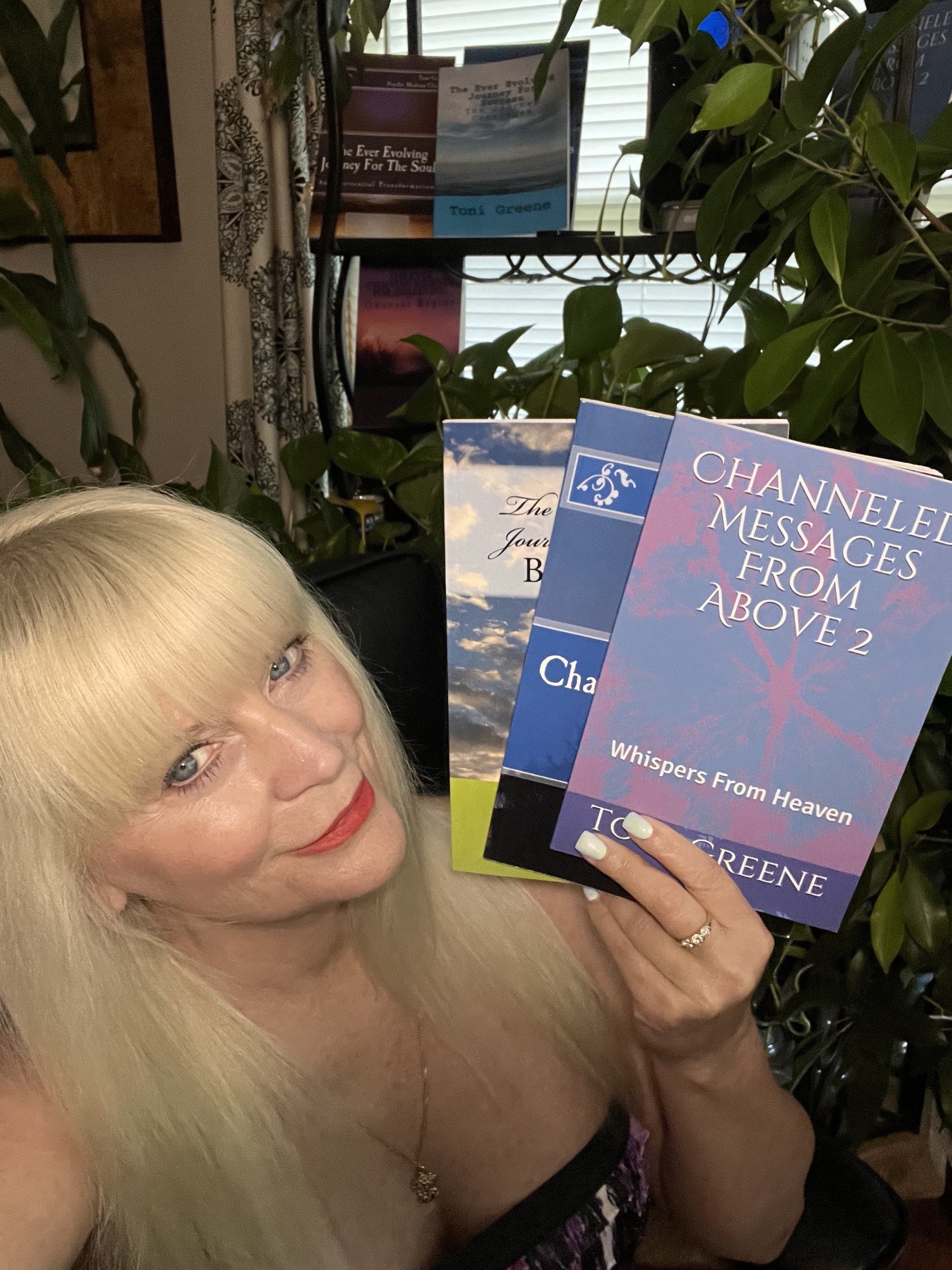 Toni Greene with her books